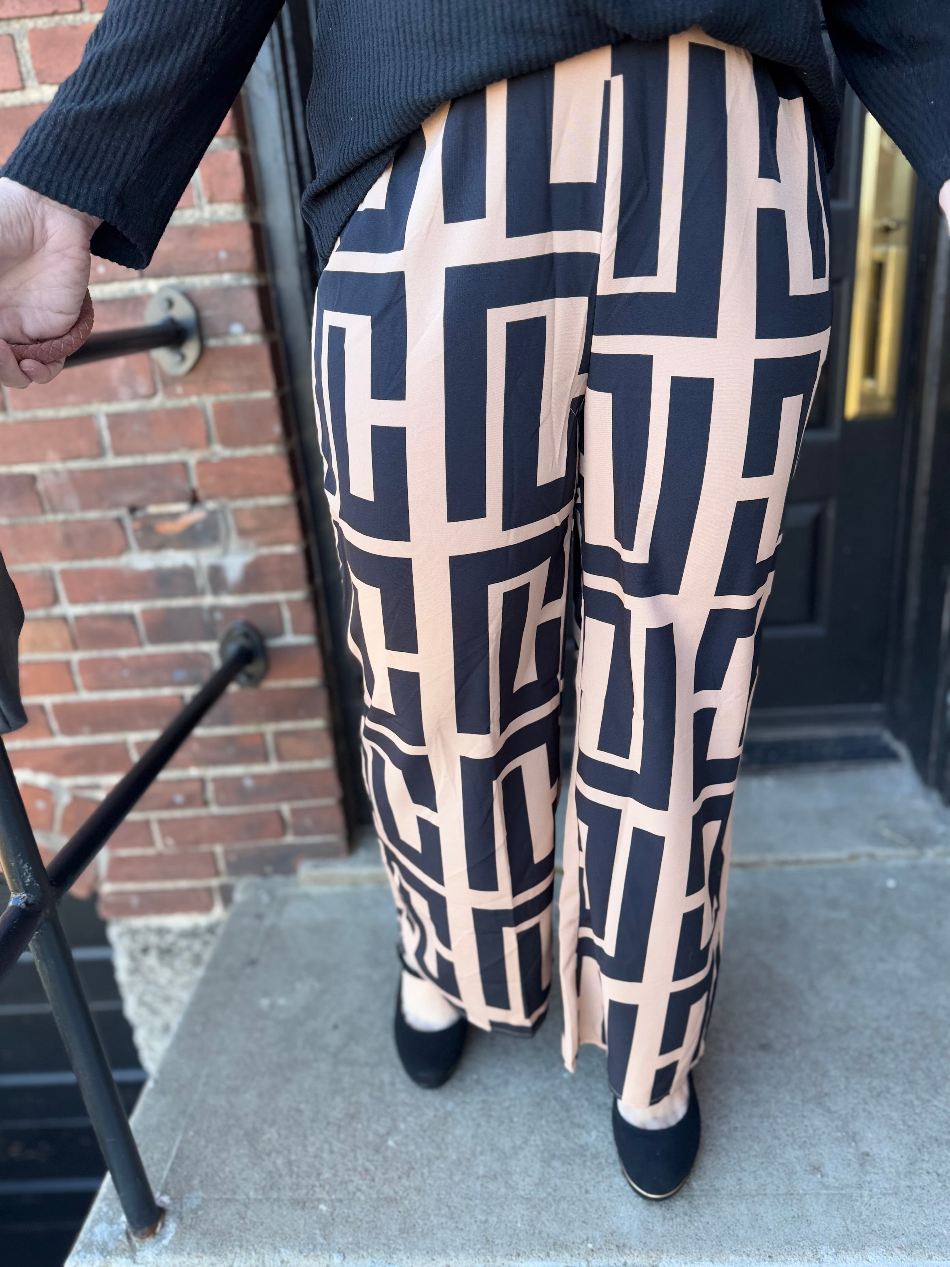 black and tan printed pants