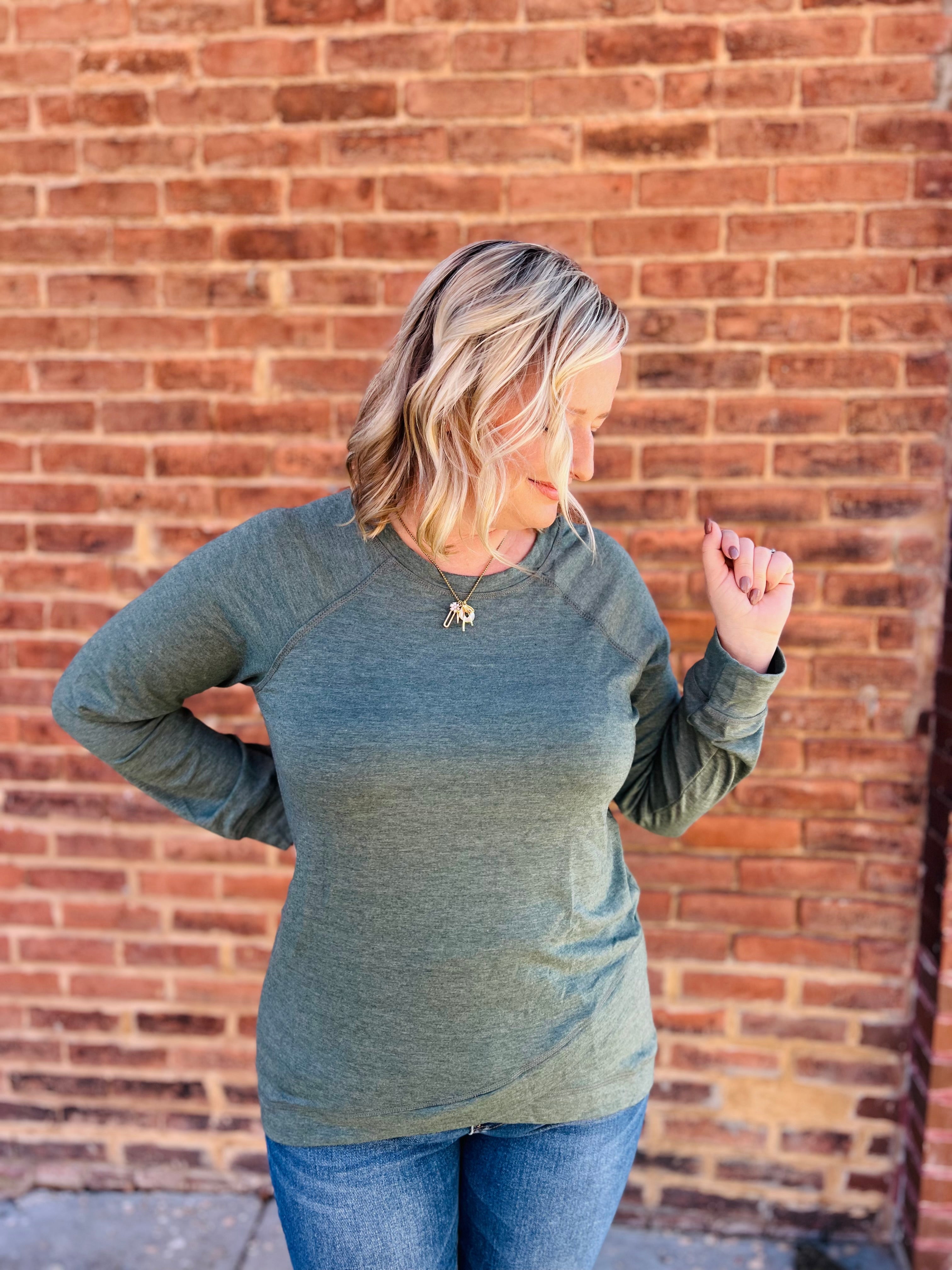 Green crisscross hem top